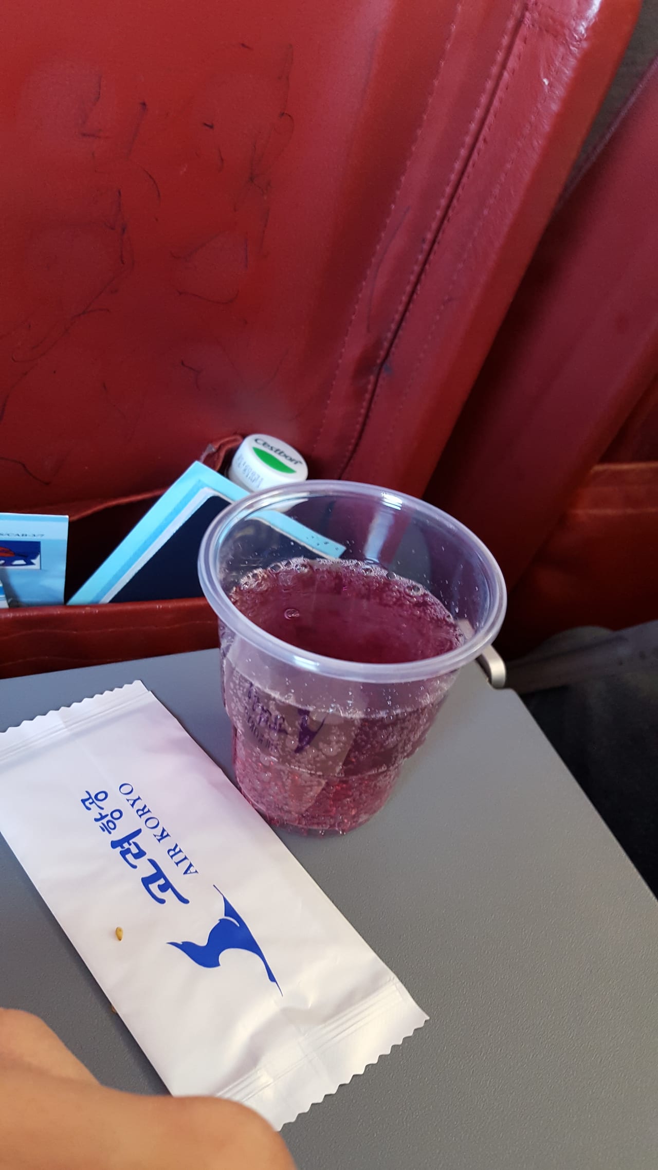 In-flight drink on Air Koryo.