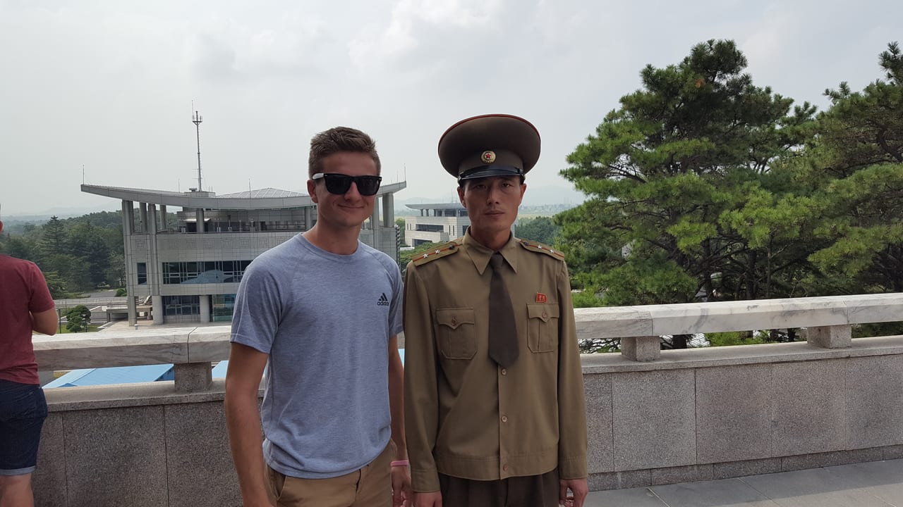 A friendly photo with a North Korean DMZ guard.