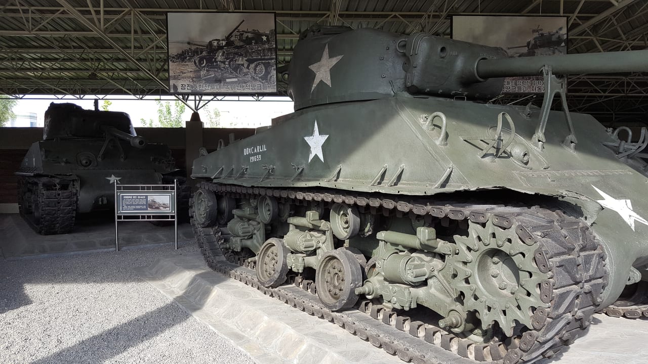 Captured U.S M4A3E8 Sherman tank (front) and M46 Patton tank (back).
