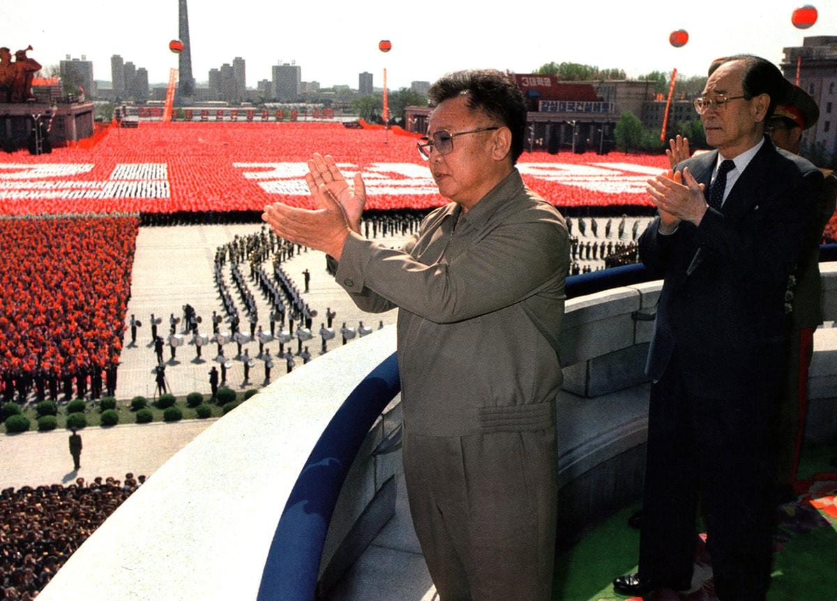 Kim Jong Il in April 2002 during a military parade in Pyongyang, celebrating the 90th anniversary of Kim Il Sung's birth and the 70th anniversary of the Korean People's Army taken from the Grand People's Study House.