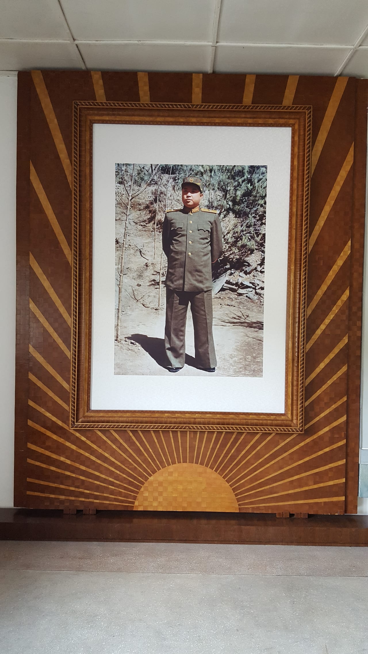 Framed photo of a military dressed Kim Il Sung