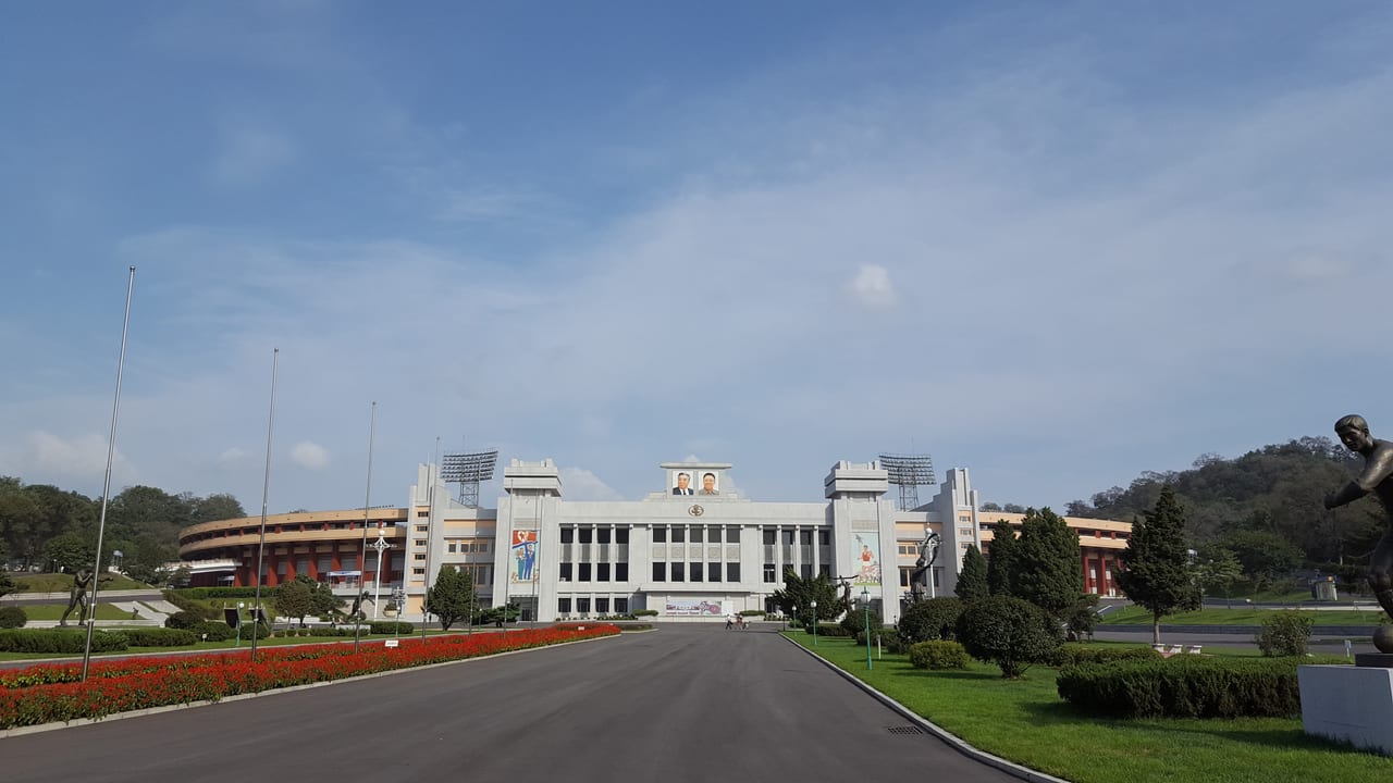 Kim Il Sung stadium pictured while standing next to the Arch of Triumph. This is the starting and ending location of the Pyongyang marathon.
