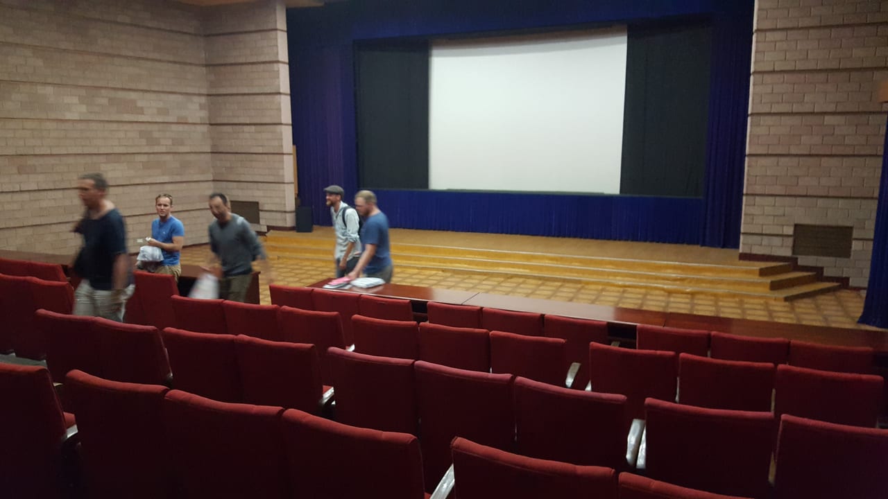 Seated before the movie starts.