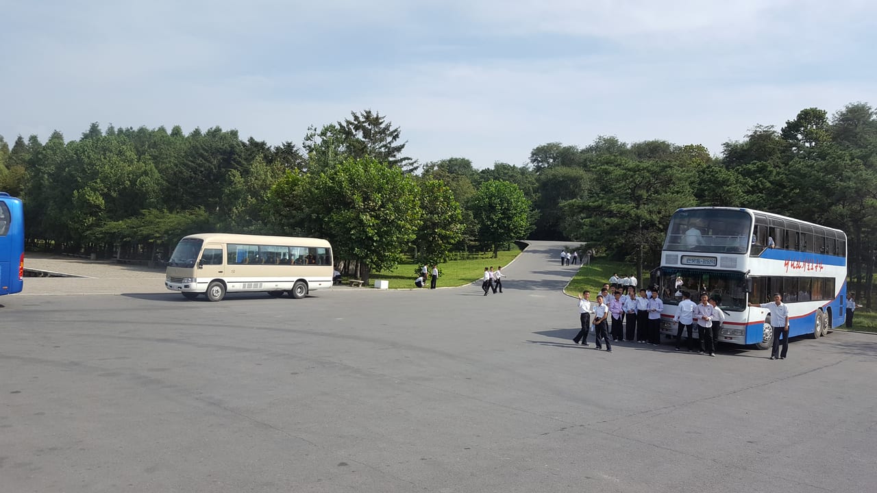 A bus of school boys getting ready to visit the Mangyondae Revolutionary Site after us.