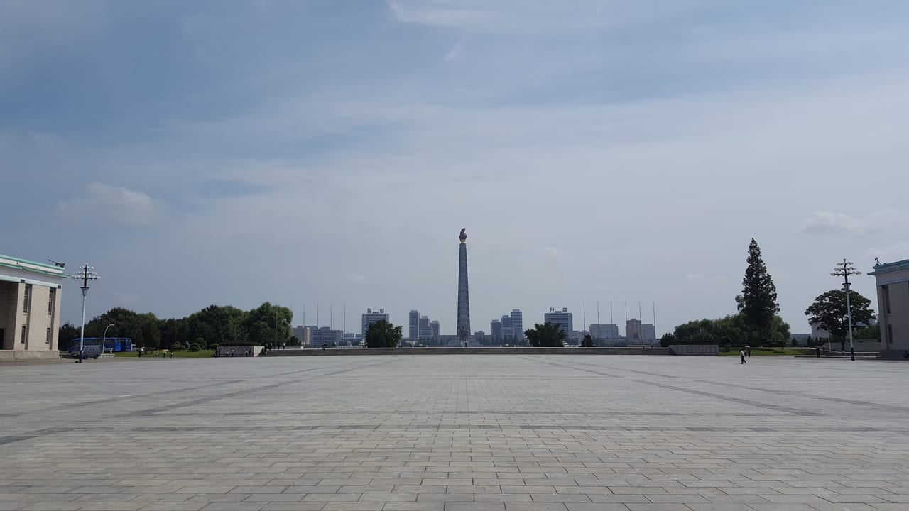 Looking at the Juche Tower across the Taedong river from Kim Il Sung Square.