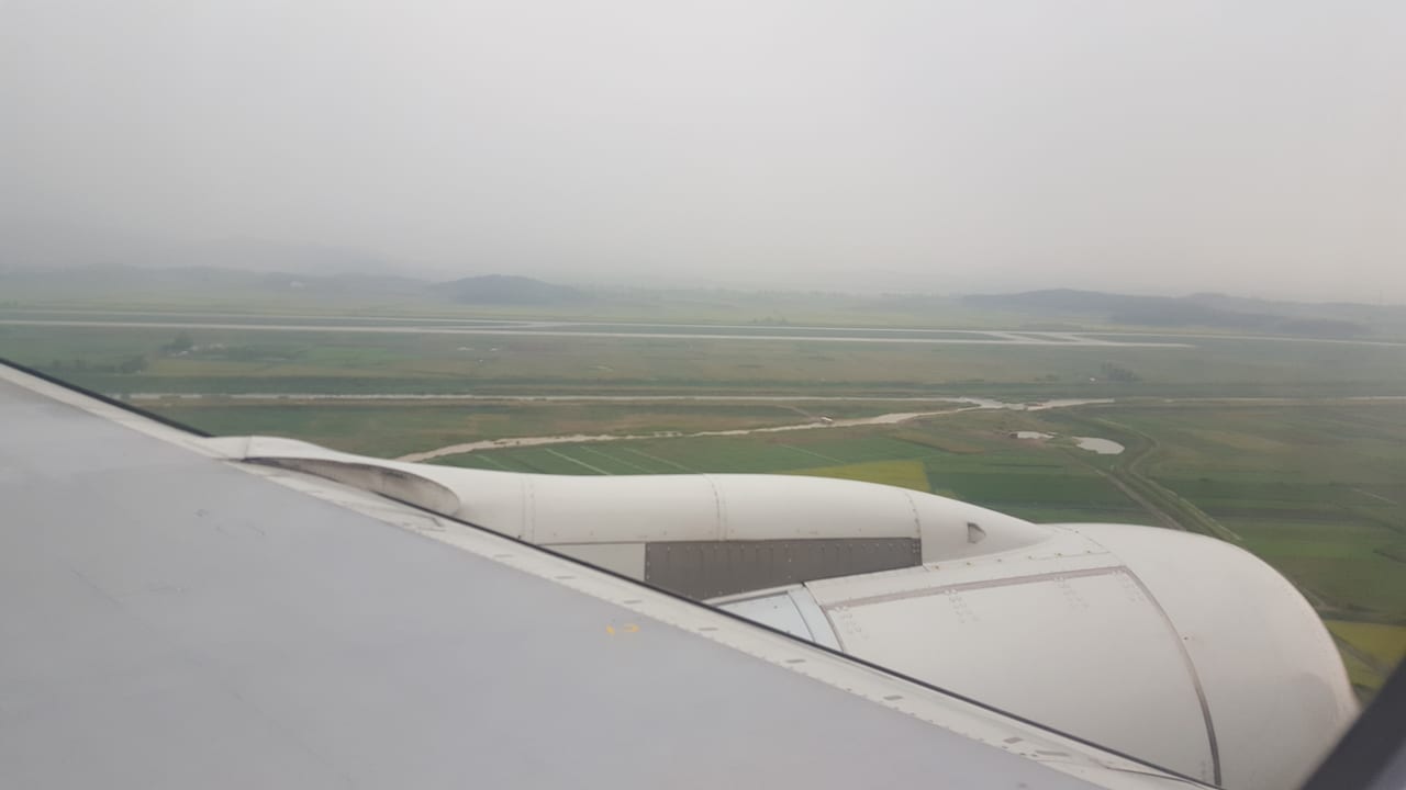 Countryside approach to Pyongyang International Airport (FNJ).