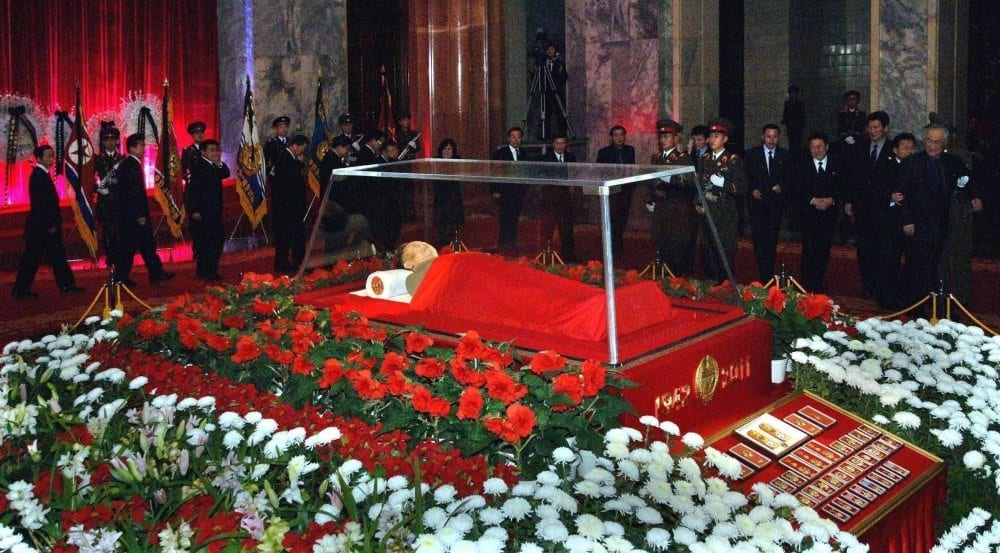 An embalmed Kim Jong Il lying in rest.