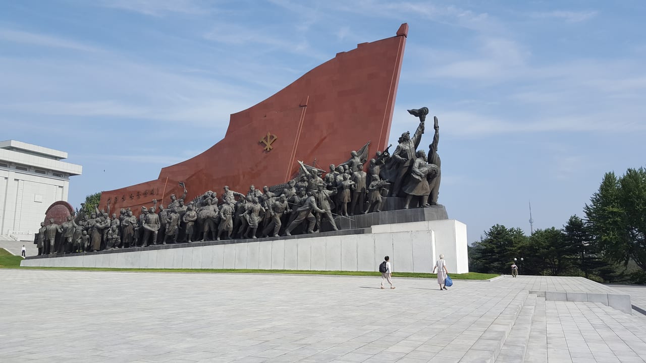 A monumental mural at the right.