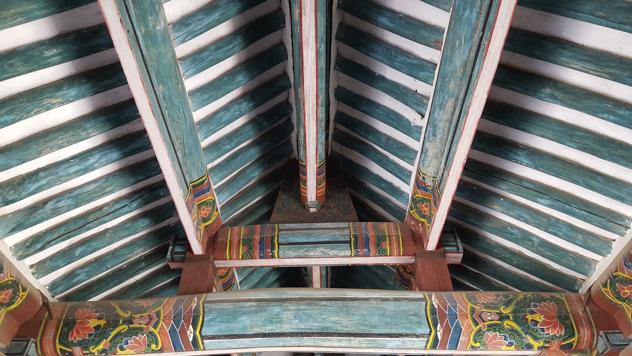 The colorful decoration of the Songgyungwan wooden structures.